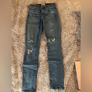 AGOLDE light blue jean with rips. US 27